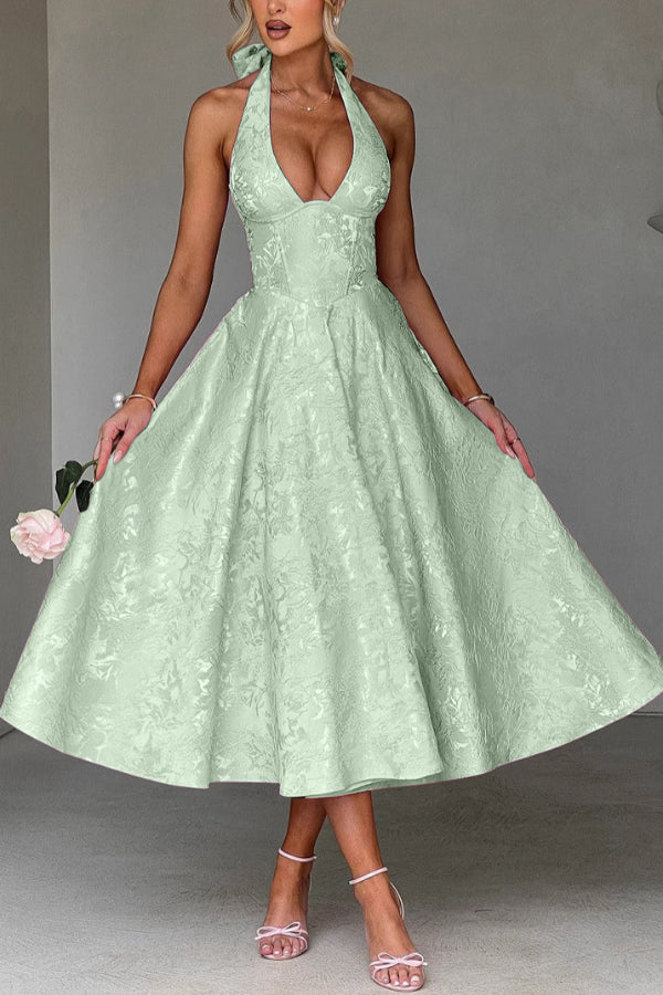 Vestido midi elegante de jacquard con cuello halter, cintura entallada y espalda abierta