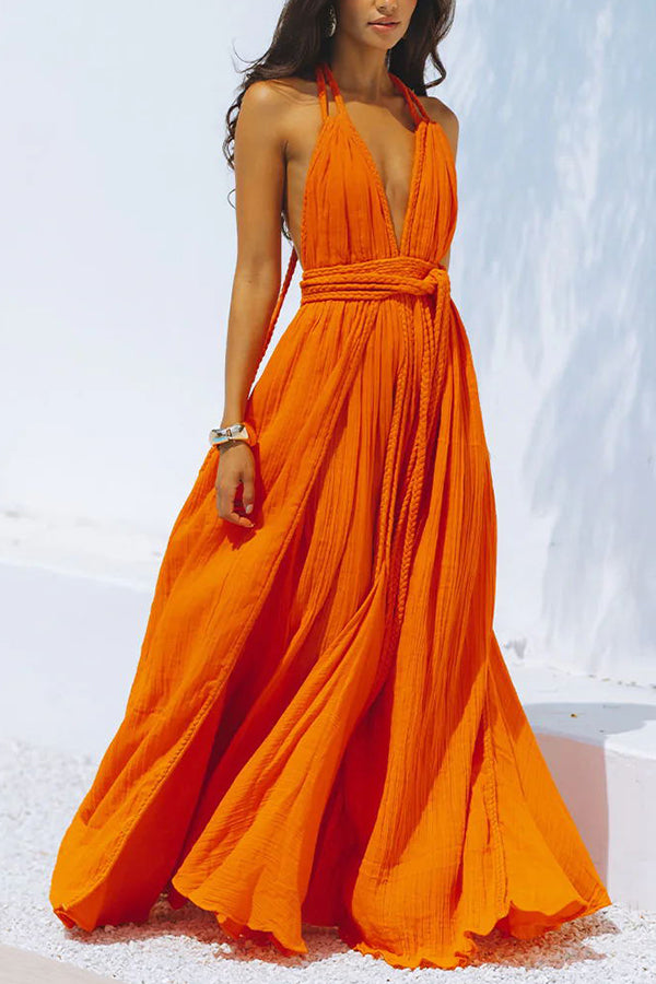 Vestido largo de mezcla de lino tipo pareo con trenzas drapeadas, escote en V profundo, cuello halter y espalda descubierta