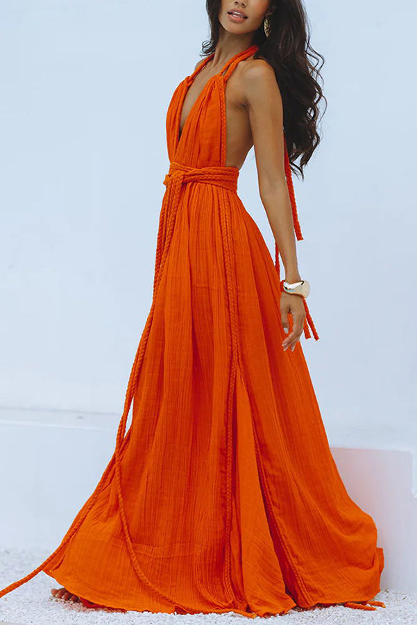Vestido largo de mezcla de lino tipo pareo con trenzas drapeadas, escote en V profundo, cuello halter y espalda descubierta