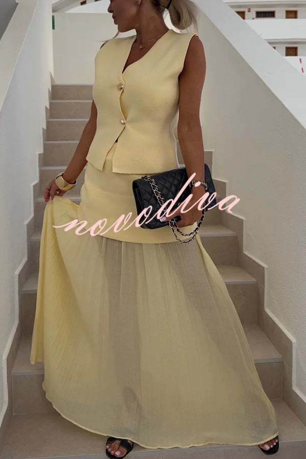 Chaleco holgado de punto con escote en V y botones dorados, elegante y con estilo