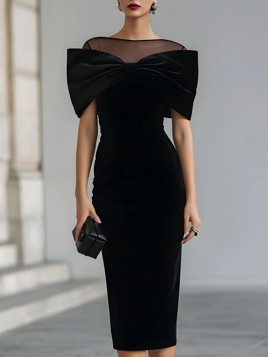 Regina ❘ Vestido midi de terciopelo negro con lazo statement
