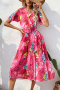Vestido midi Paulette plisado con estampado floral en contraste y cinturón