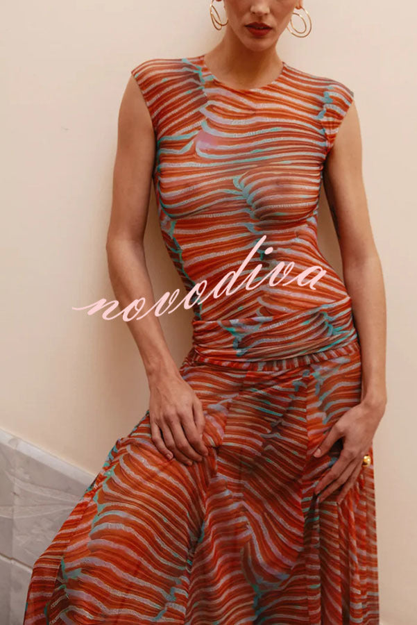Conjunto Bella de body de malla elástica con estampado exclusivo y falda larga de talle alto con cintura elástica