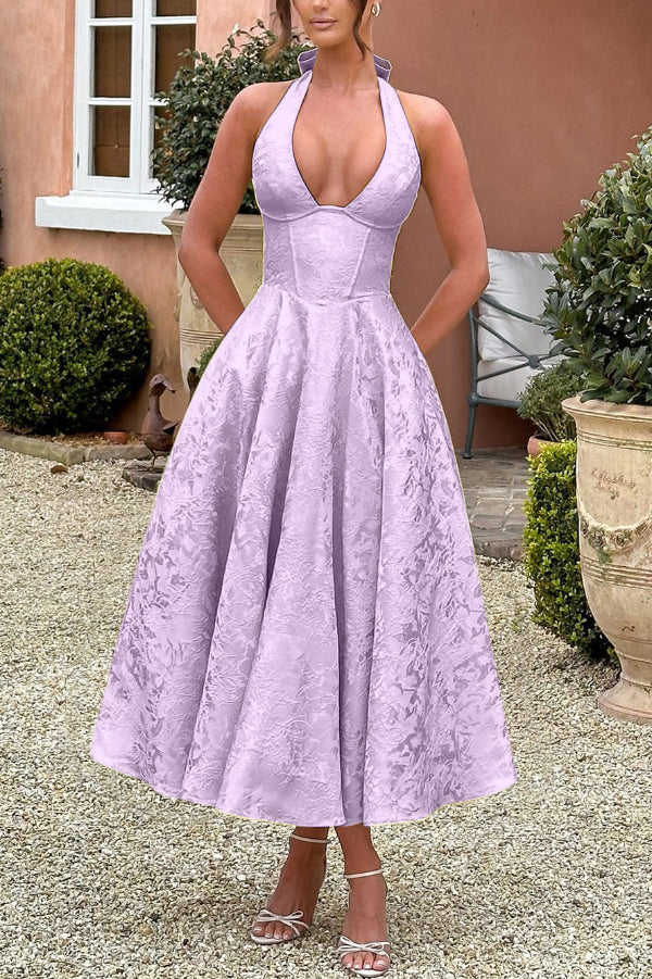Vestido midi elegante de jacquard con cuello halter, cintura entallada y espalda abierta