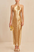 Vestido largo Sexy Toda la Noche metalizado con cuello halter, espalda descubierta, flecos y abertura