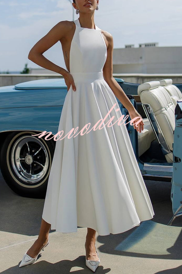 Vestido midi elegante de color liso con cuello halter, lazo y cintura ceñida