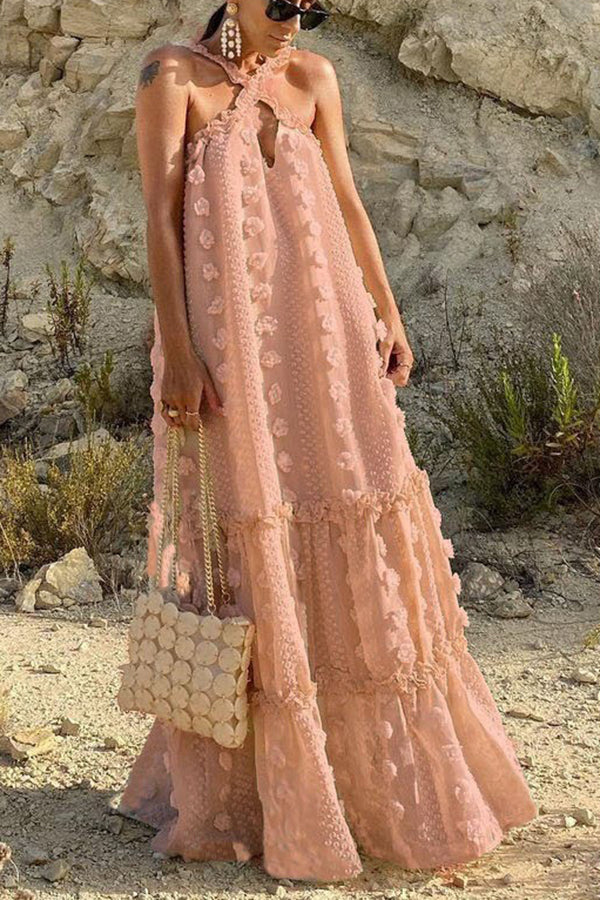 Vestido largo de fiesta con cuello halter y adorno floral