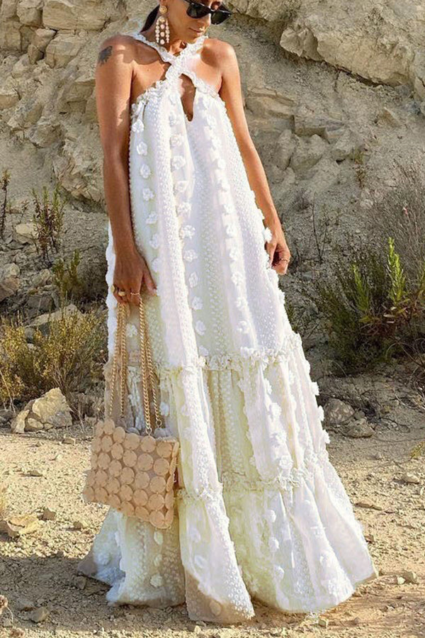 Vestido largo de fiesta con cuello halter y adorno floral