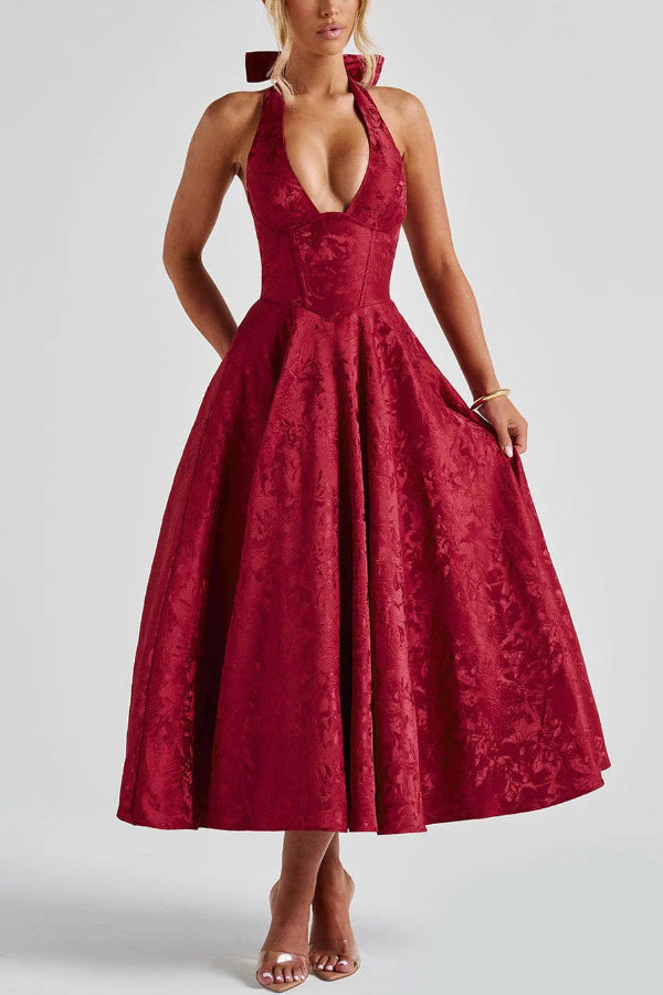 Vestido midi elegante de jacquard con cuello halter, cintura entallada y espalda abierta
