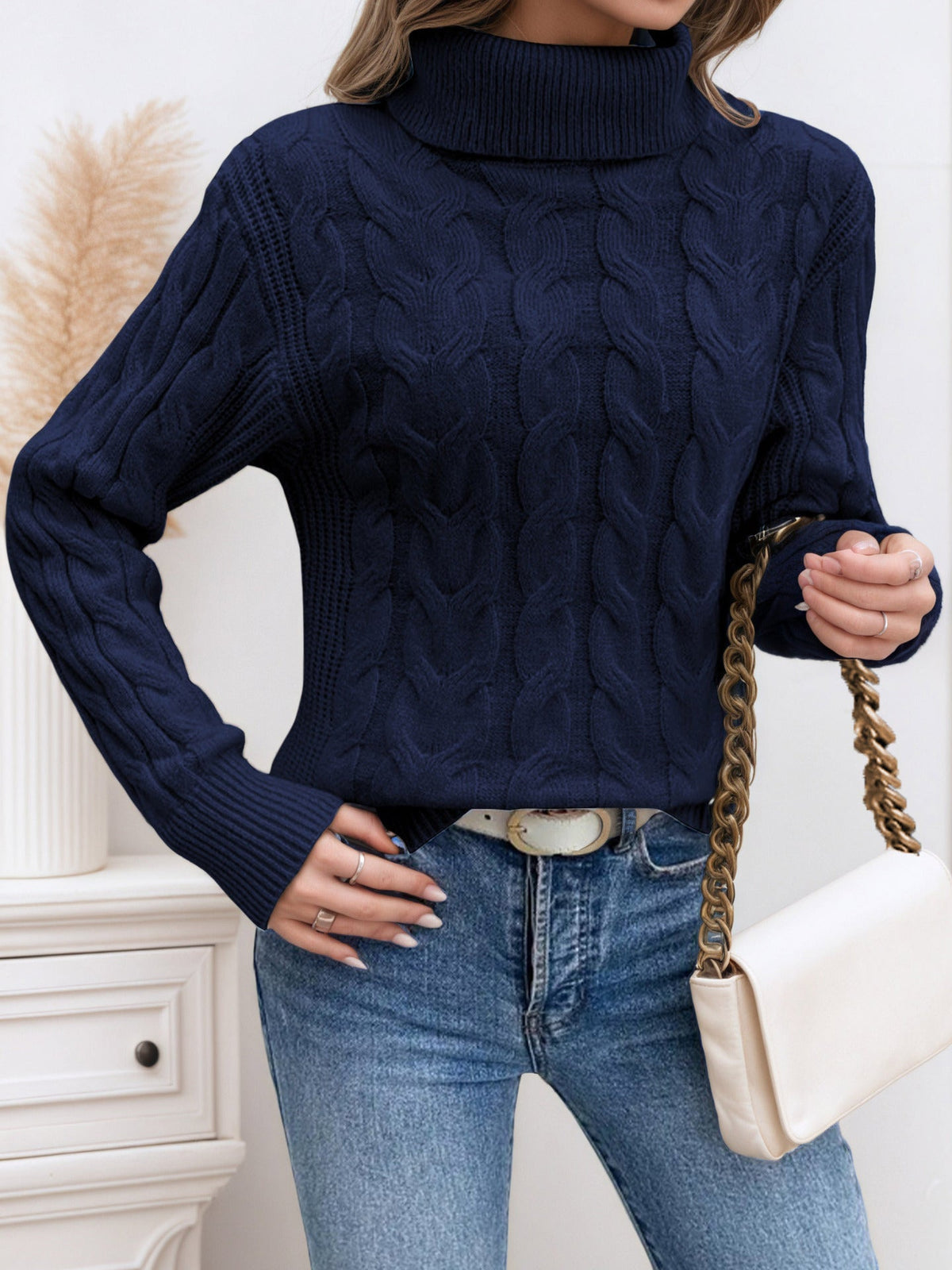 Nova: jersey de cuello alto trenzado y acogedor