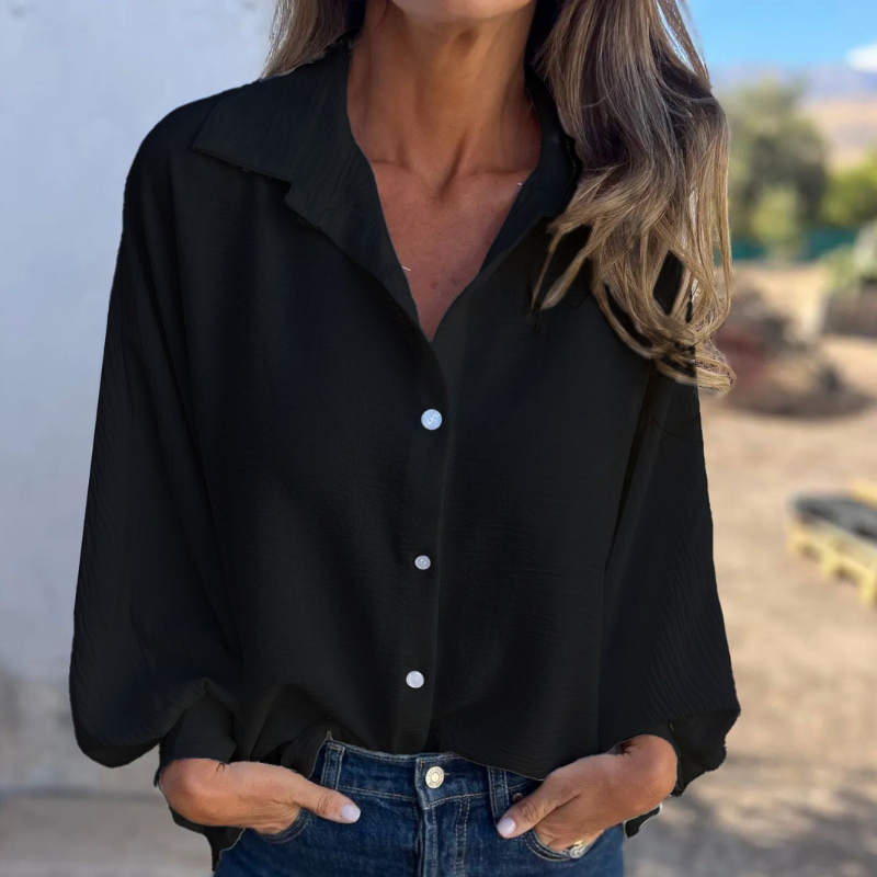 Aria: blusa con botones