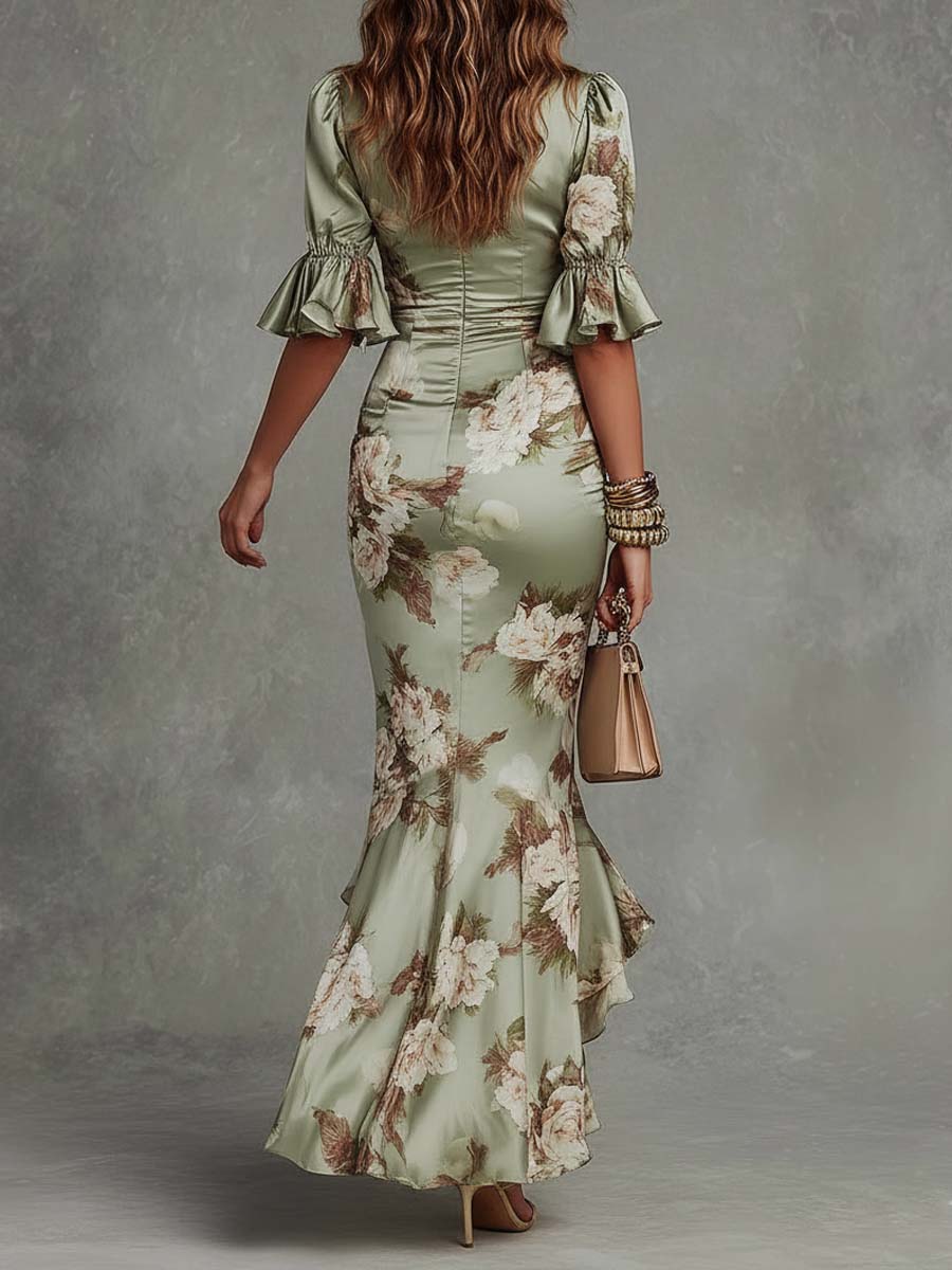 Anna - Vestido largo asimétrico en satén verde con escote en V, mangas abullonadas acampanadas y estampado floral