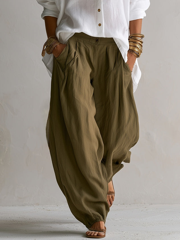 Conjunto de camisa blanca holgada y pantalón verde de pierna ancha tipo farol