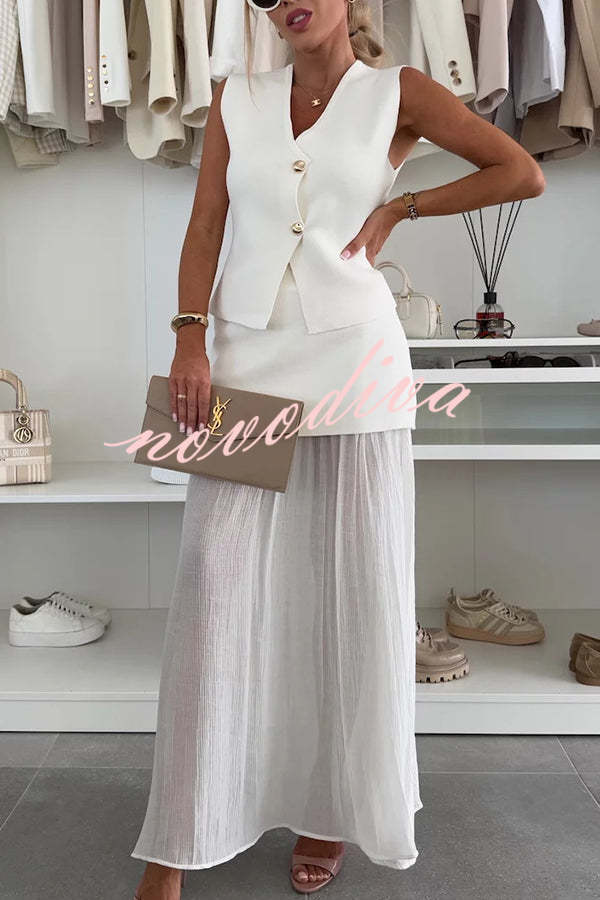 Chaleco holgado de punto con escote en V y botones dorados, elegante y con estilo