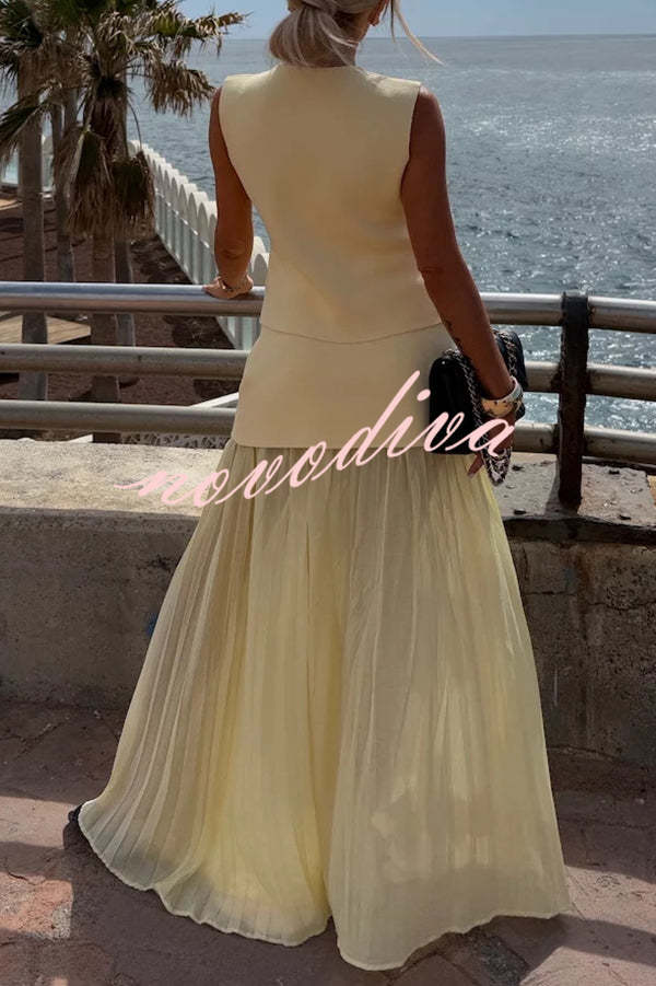 Chaleco holgado de punto con escote en V y botones dorados, elegante y con estilo