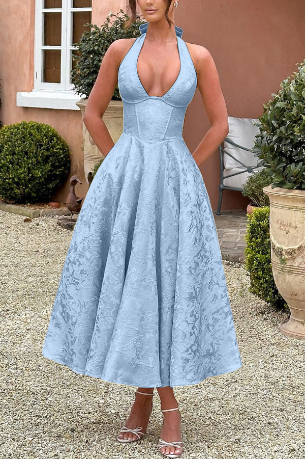 Vestido midi elegante de jacquard con cuello halter, cintura entallada y espalda abierta