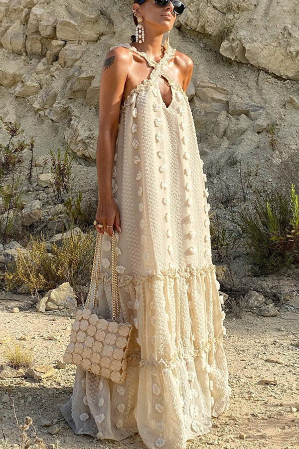 Vestido largo de fiesta con cuello halter y adorno floral