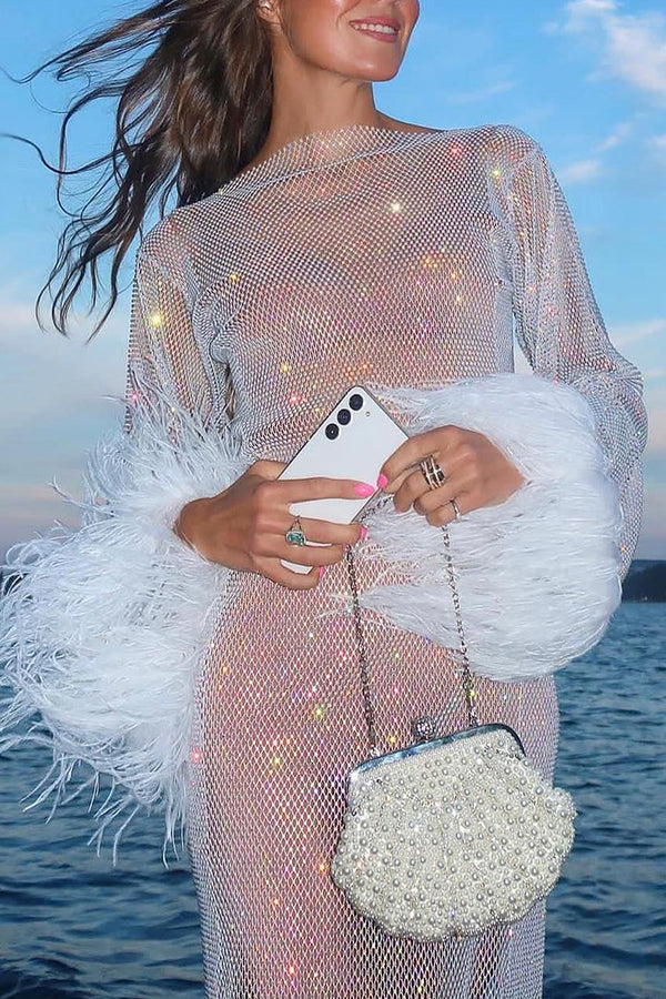 Minivestido de fiesta Sorpresa Nocturna de tejido con strass y mangas de plumas