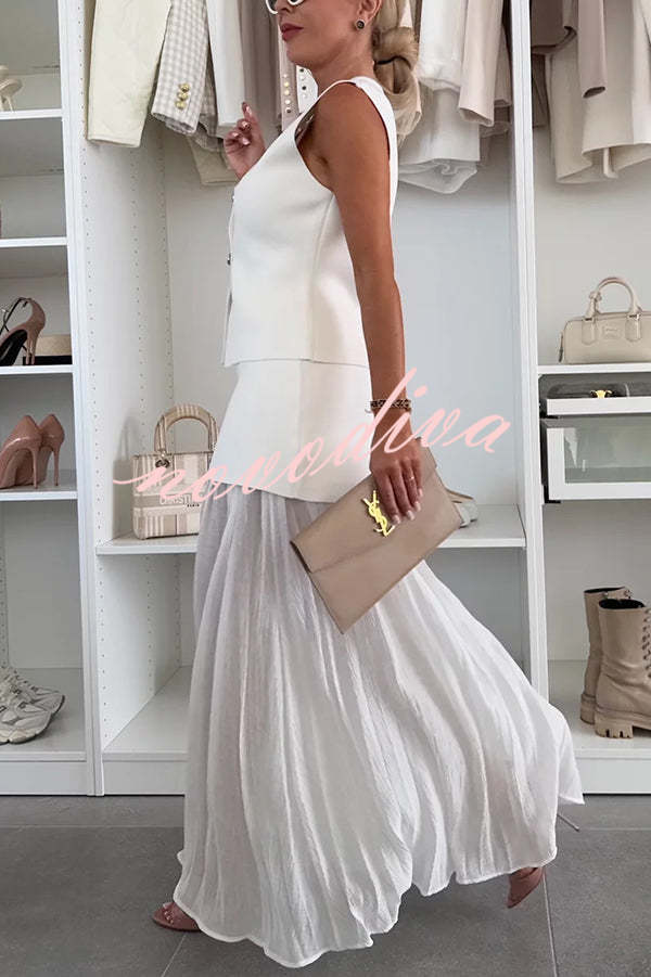 Chaleco holgado de punto con escote en V y botones dorados, elegante y con estilo