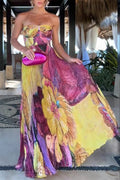 Vestido largo plisado con estampado floral vibrante y escote corazón