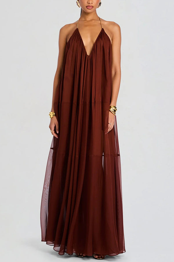 Vestido largo vaporoso de gasa ligera con cuello halter de cadena, espalda descubierta y corte en A
