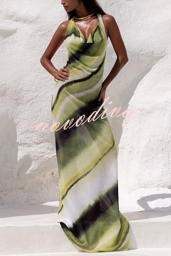 Vestido largo Misha estampado con escote drapeado y cuello halter con lazada, ideal para vacaciones