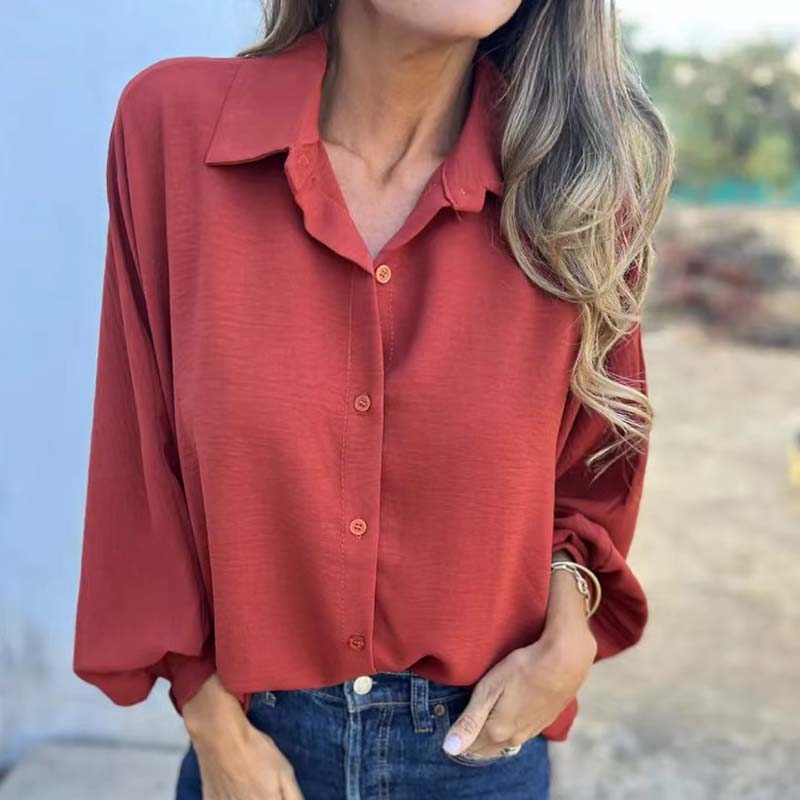 Aria: blusa con botones
